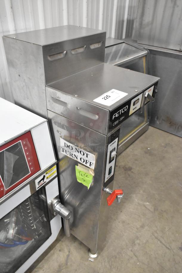 Fetco CBS-51H15 stainless steel countertop coffee machine with hot water dispenser, tagged "Do Not Turn Off," in fair condition.