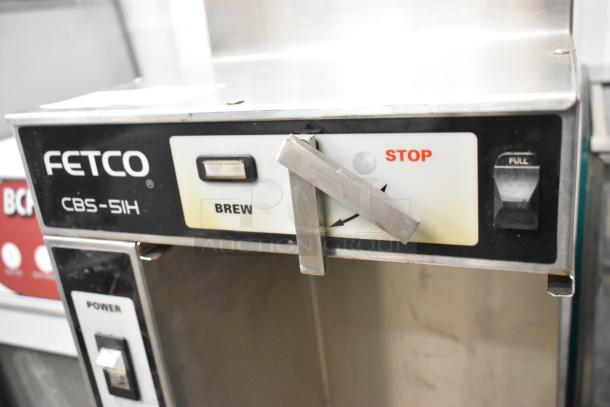 Fetco CBS-51H15 stainless steel commercial coffee machine with hot water dispenser. Features brew and stop controls.