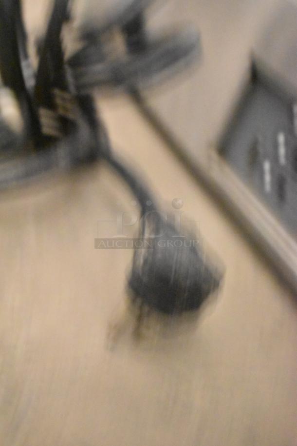 Blurry image of item, no discernible details of the Metal Commercial Countertop Display Case Merchandiser visible.