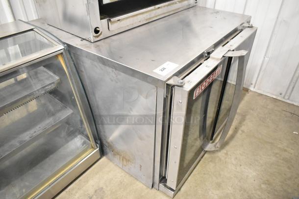 Blodgett Helix stainless steel commercial full-size convection oven with view-through doors and metal racks; used condition.