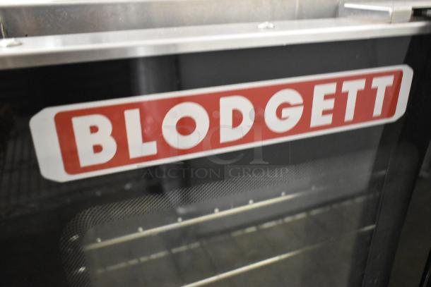 Blodgett Helix stainless steel commercial convection oven with view-through doors and metal racks, featuring Blodgett logo.