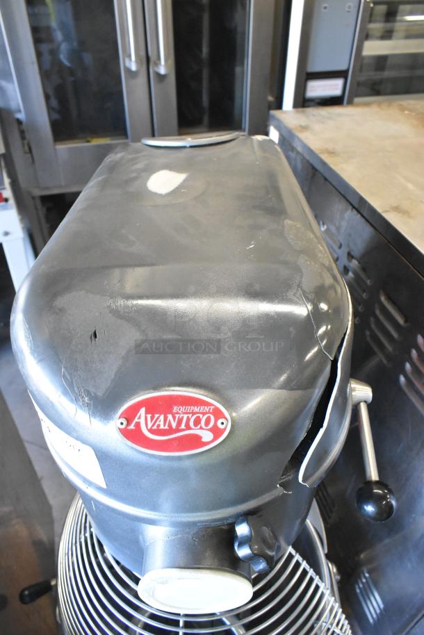 Avantco MX40H 40 Quart Dough Mixer with bowl, guard, paddle, whisk, and hook. Scratched metal exterior. 240V, 1 Phase.