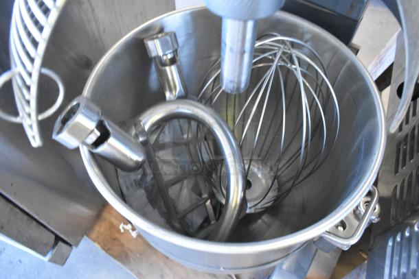 Avantco MX40H 40 Quart planetary dough mixer with stainless steel bowl, bowl guard, paddle, whisk, and dough hook attachments.