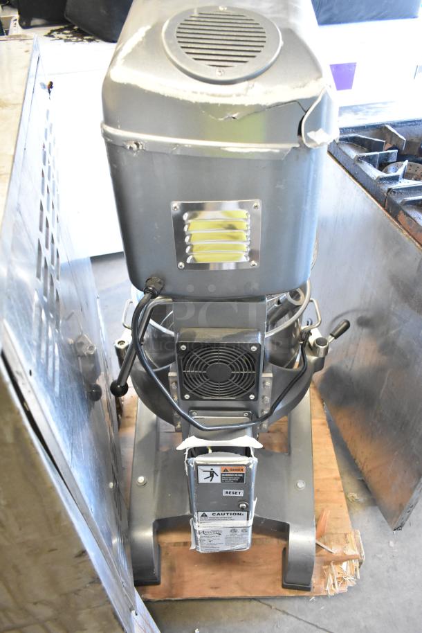 Avantco MX40H 40 Quart Commercial Dough Mixer, visible wear, includes mixing bowl, paddle, whisk, dough hook, 240V, 1 phase.