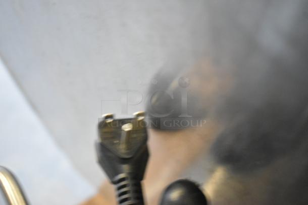 Avantco MX40H commercial floor dough mixer plug, showing 240V power connection. Mixer not visible.