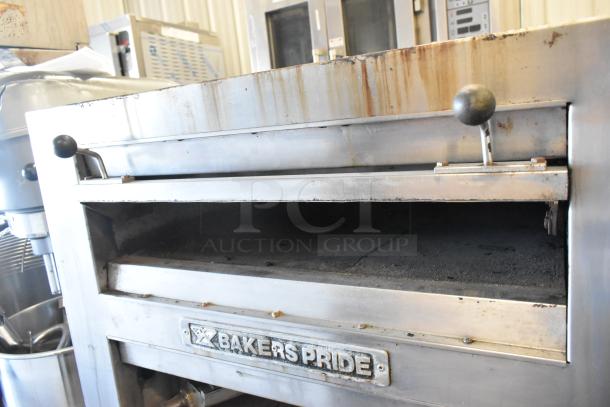 Bakers Pride EP-2-2828 stainless steel commercial pizza oven, two decks, on casters, used condition, 208V, 1 phase.