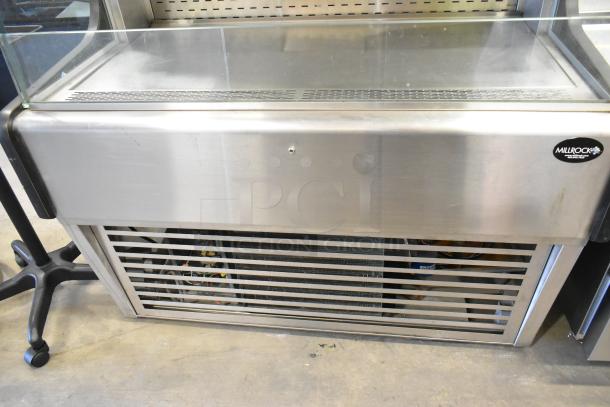 MillRock WC 4881 GT 48 metal merchandiser with metal shelves, 208-230V, 1 phase; visible logo, good condition.