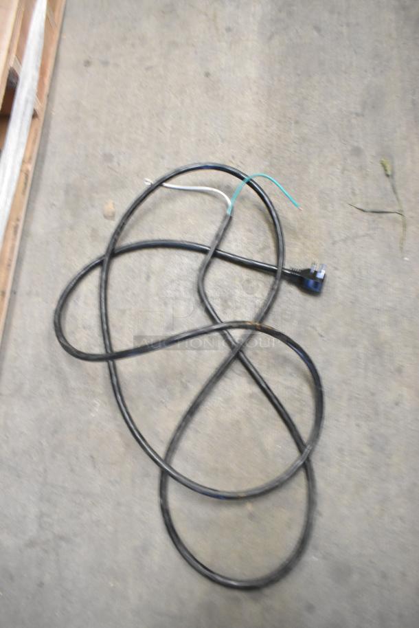 Power cord for MillRock WC 4881 GT 48 Grab N Go Merchandiser, 208-230V, 1 Phase, shown on a concrete floor.