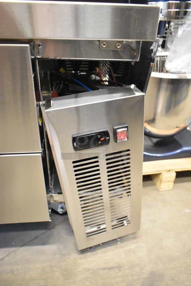 Brand new Avantco 178CBE72HC stainless steel chef base with 4 drawers, commercial casters, 115V, 1 phase, visible dent.