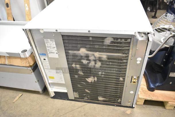 BRAND NEW SCRATCH AND DENT Scotsman MC1030MA-32A stainless steel ice head, 2024 model. 208/230V, 1 Phase. Tags visible.