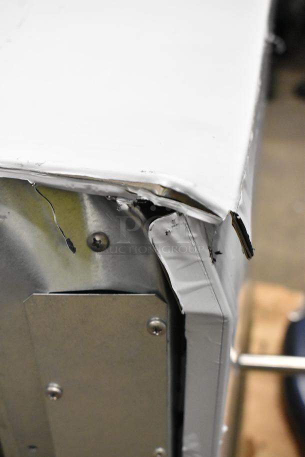 Brand new 2024 Scotsman MC1030MA-32A ice head, stainless steel, showing dent on the corner. 208/230V, 1 phase.