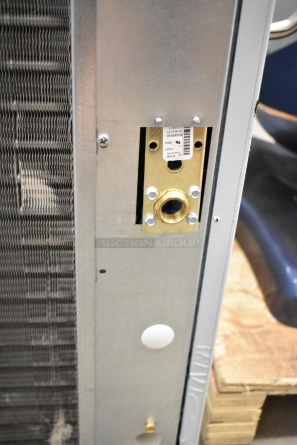 BRAND NEW SCRATCH AND DENT 2024 Scotsman MC1030MA-32A ice head, stainless steel, 208/230V, visible part label.