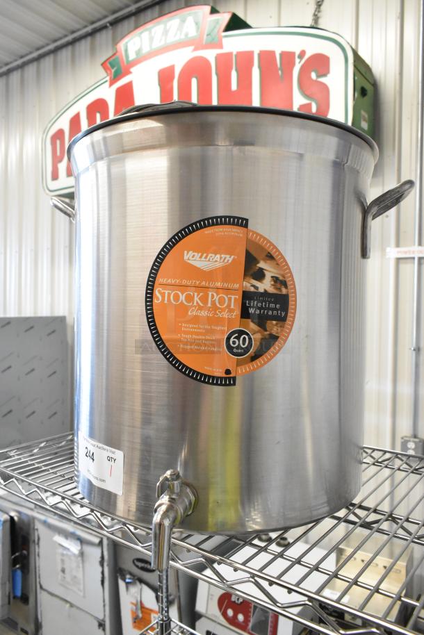 Brand new Vollrath 60 qt aluminum stock pot, scratch and dent condition, rugged welded handles, lifetime warranty label.
