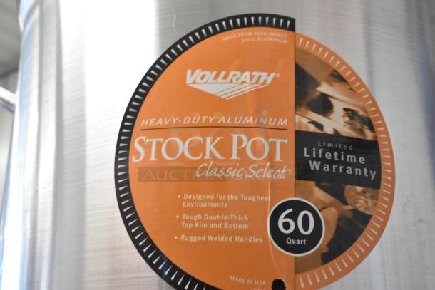 Vollrath 60 Quart Stock Pot, heavy-duty aluminum, scratch and dent, features rugged welded handles, lifetime warranty.