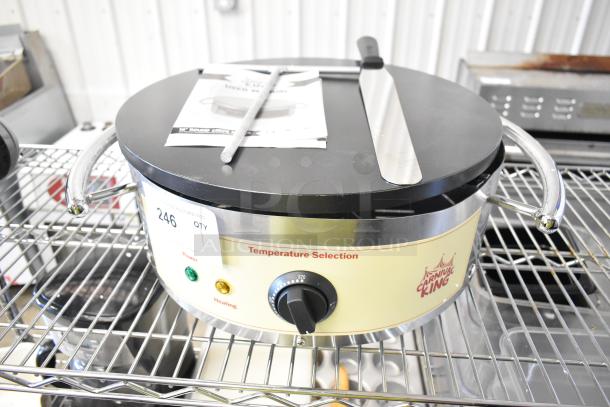 Brand new Carnival King 16" stainless steel crepe maker, model 382TCMPT16A. Features non-stick surface, temperature selector.