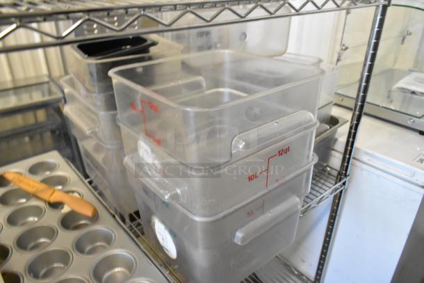 Tier lot including poly bins marked in liters, muffin baking pan, and cutting boards on metal shelving.