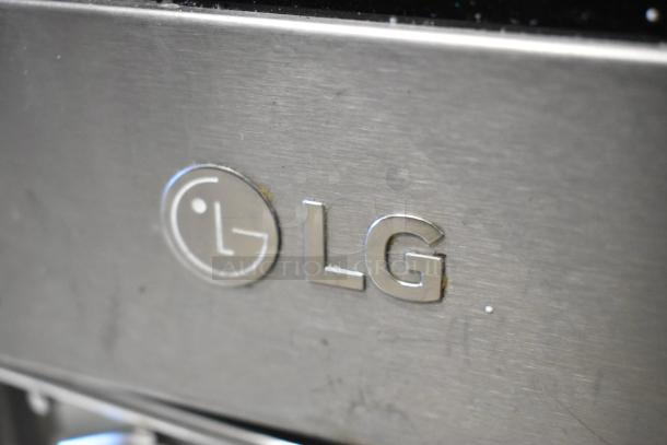 LG LMV1762ST stainless steel microwave oven showing LG logo, features 120 volts, 1 phase. Includes plate.