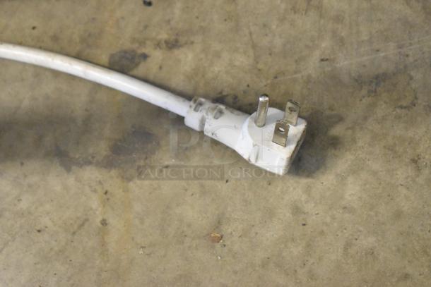 Plug of the Magic Chef HMCF7W4 Chest Freezer, showing standard three-prong connector. Near new condition.
