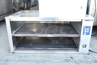 Prince Castle DHB-P1A stainless steel countertop holding bin, dual shelves, control panel, 208-240V, in good used condition.