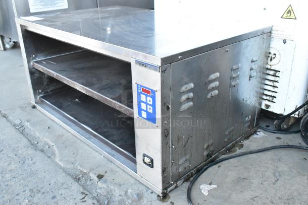 Prince Castle DHB-P1A stainless steel countertop holding bin, 208-240V, 1 Phase. Features controls panel, visible wear.