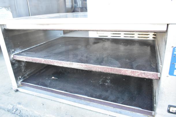 Prince Castle DHB-P1A stainless steel holding bin, countertop model, dual shelves, 208-240 volts, used condition.