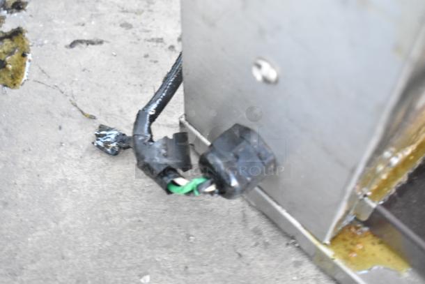 Prince Castle DHB-P1A stainless steel holding bin, damaged power cord, 208-240 volts, 1 phase. Visible wear and spillage.