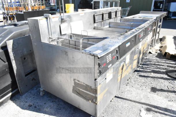 Giles EOF-24 3-bay stainless steel commercial fryer with dumping station on casters. Electric, 480 volts. Visible wear.
