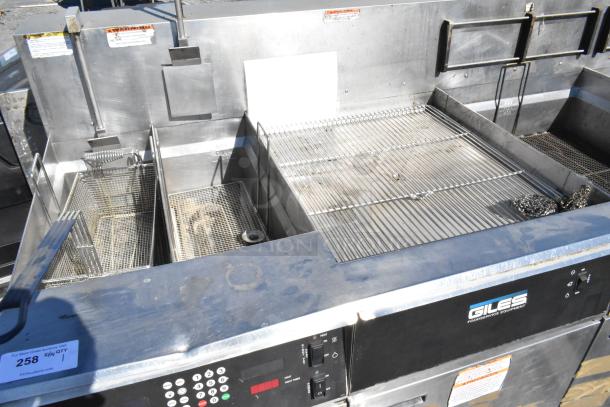 Giles EOF-24 stainless steel 3-bay deep fat fryer with dumping station, commercial casters, 480V, control panel visible.