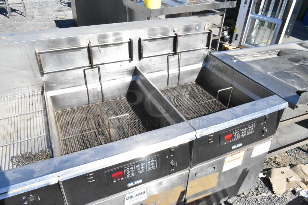 Giles EOF-24 stainless steel 3-bay electric deep fat fryer with dumping station, on commercial casters, 480V.