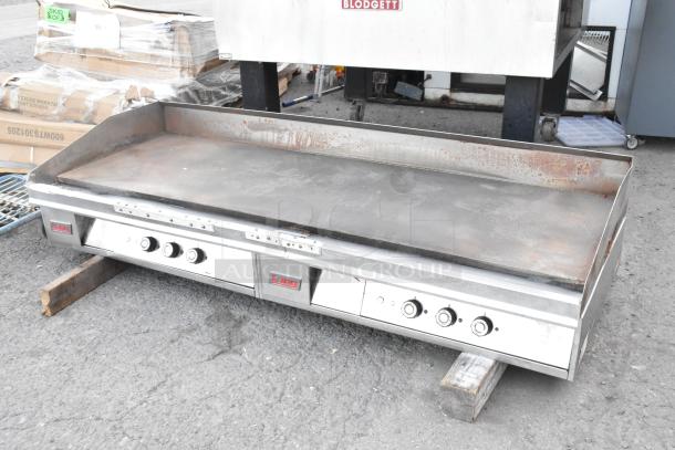 Lang 172T-480V stainless steel commercial flat top griddle. Electric, 480V, 3-phase. Visible brand logo. Used condition.