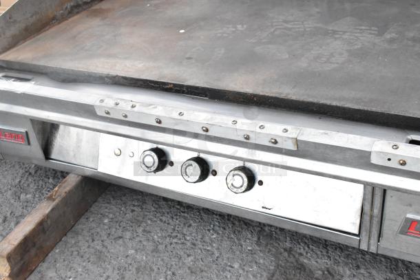 Lang 172T-480V stainless steel electric griddle; used condition, visible controls, 480V, 3-phase. Flat top surface.