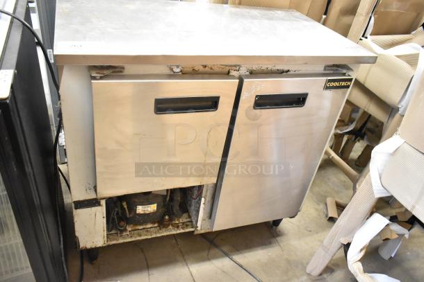 Cooltech Custom 36LB stainless steel 2-door undercounter cooler, 115 volts, 1 phase. Visible wear, model label intact.