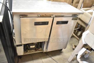 Cooltech Custom 36LB stainless steel 2-door undercounter cooler, 115 volts, 1 phase. Visible wear, model label intact.