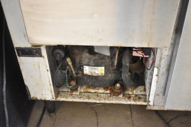 Cooltech Custom 36LB stainless steel 2-door undercounter cooler, shows wear and rust. 115 volts, 1 phase.