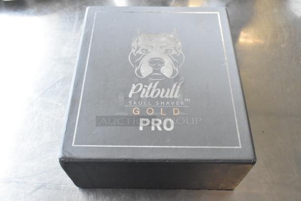Box of Pitbull Gold Pro PBG4-8700 Head and Face Shaver. Brand new condition with logo and product name on the front.