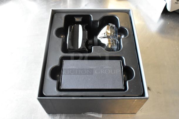 Brand new Pitbull Gold Pro PBG4-8700 head and face shaver in box; features ergonomic design and dual blades for close shave.