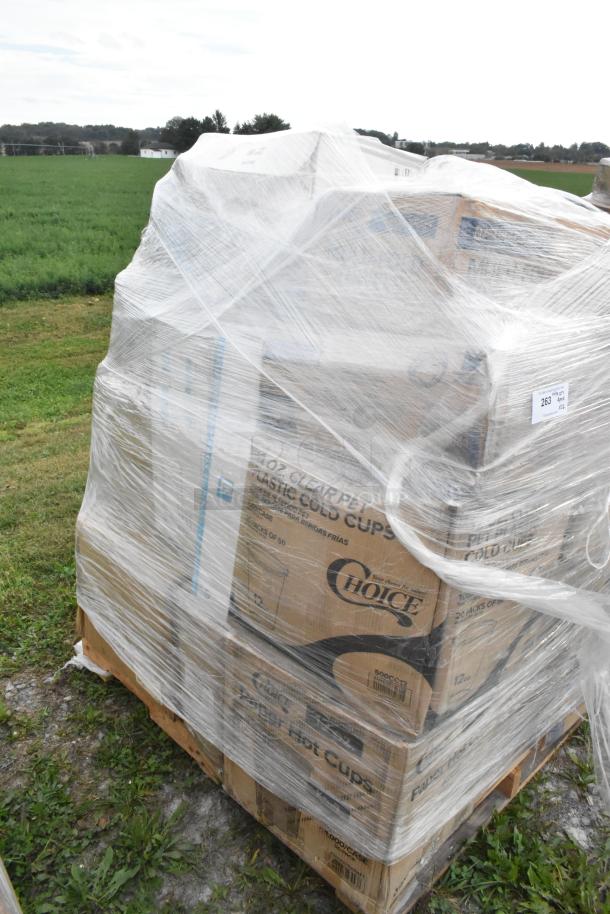 Pallet of 26 scratch and dent items including napkins, cold cups, and container, wrapped in plastic wrap for auction.