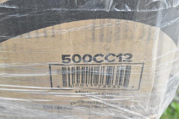 Cardboard box marked "500CC12" with barcode, wrapped in plastic. Part of auction lot of 26 scratch and dent items.
