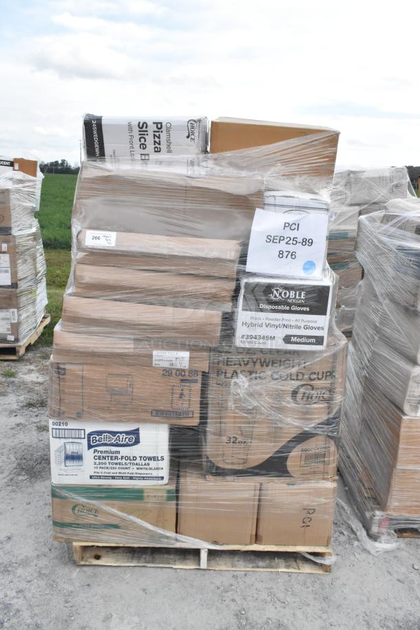 Pallet of scratch and dent items including clamshell pizza slice boxes, plastic cups, and disposable gloves, shrink-wrapped.