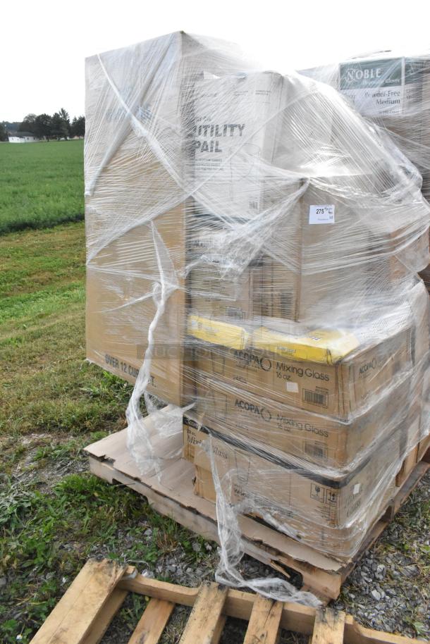 24 new scratch and dent items including mixing glasses and a rice cooker. Items are shrink-wrapped on a pallet.