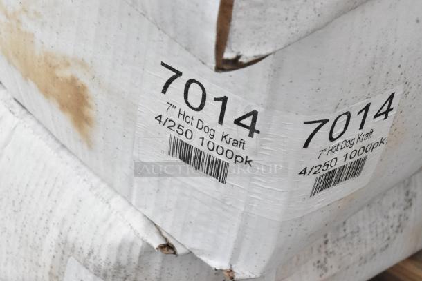 Cardboard boxes with item label "7014 7'' Hot Dog Kraft, 4/250 1000pk." Boxes show signs of wear and light stains.