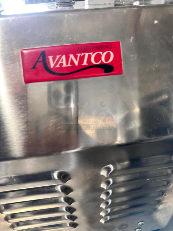 Avantco MG12 commercial meat grinder, stainless steel, #12 model, superb condition, 110V, label visible.