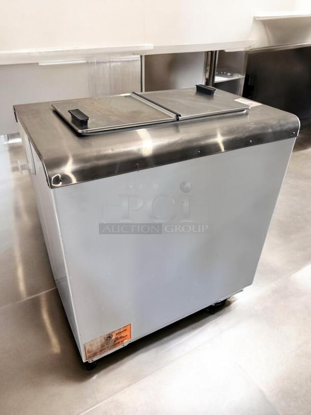 Like-new Global 2SF ice cream chest freezer, NSF certified, stainless steel top, fully tested, made in U.S.A.