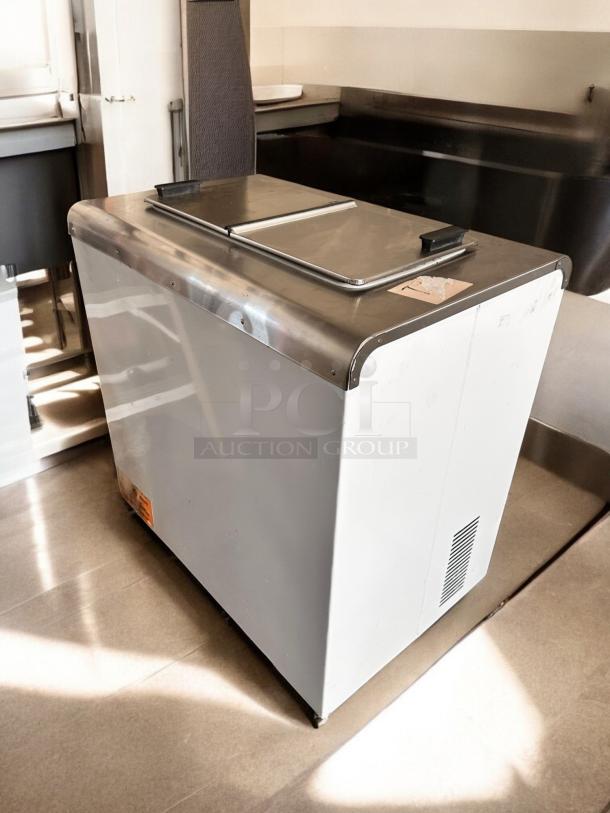 Like-new Global 2SF ice cream chest freezer, NSF certified, stainless steel top, fully tested, made in the USA.