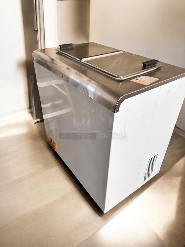Global 2SF ice cream chest freezer, like-new, NSF certified, stainless steel top, fully tested, made in USA.