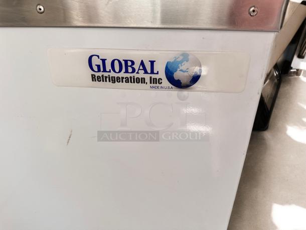 Like-new Global 2SF ice cream chest freezer, NSF certified, fully tested. Global Refrigeration, Inc. label visible.