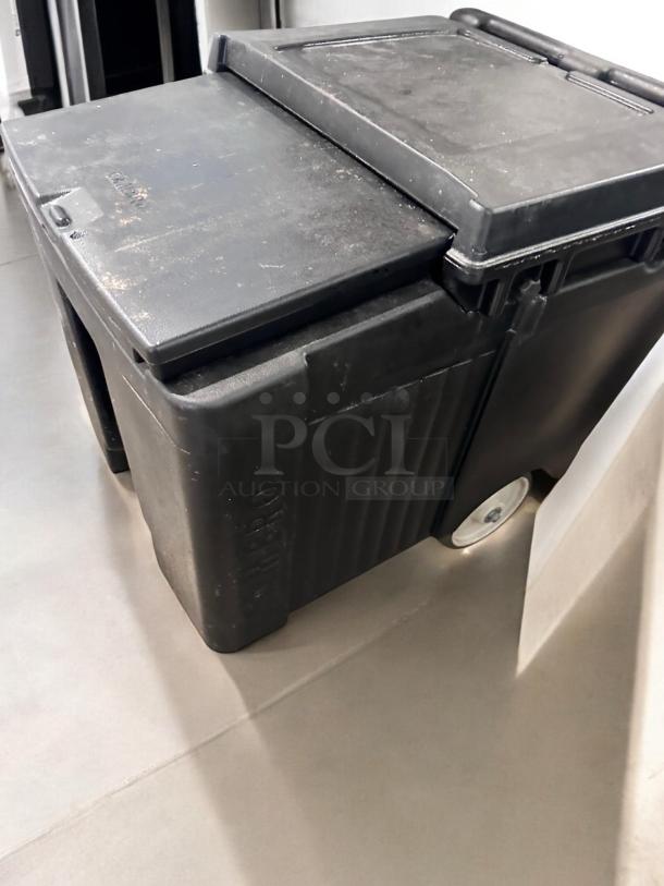 Cambro ICS100 insulated ice transport cart, 100 lb capacity, black with sliding lids, in top-tier condition, fully tested.