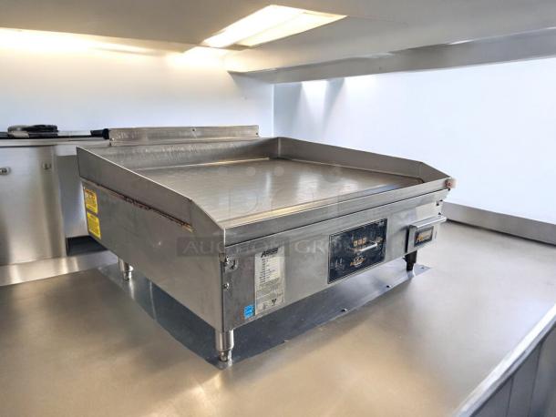 AccuTemp GGF1201A3650 gas griddle, 36" wide, outstanding condition, fully tested, stainless steel, 120V, model label visible.