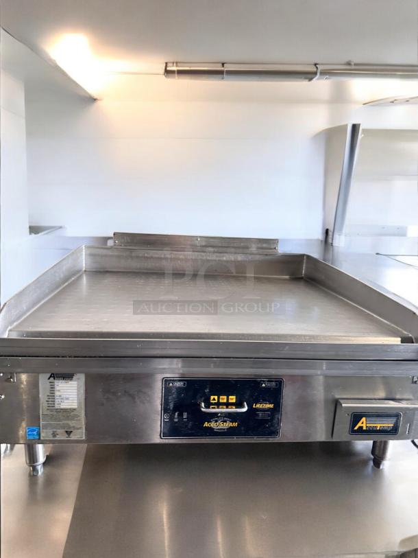 Outstanding condition AccuTemp GGF1201A3650 Accu-Steam Gas Griddle. 36" wide, 120V, fully tested, working, stainless steel.