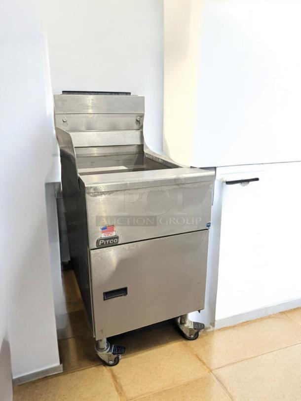 Pitco SG18 gas fryer, excellent condition, natural gas, floor model, stainless steel, fully tested, American flag label.